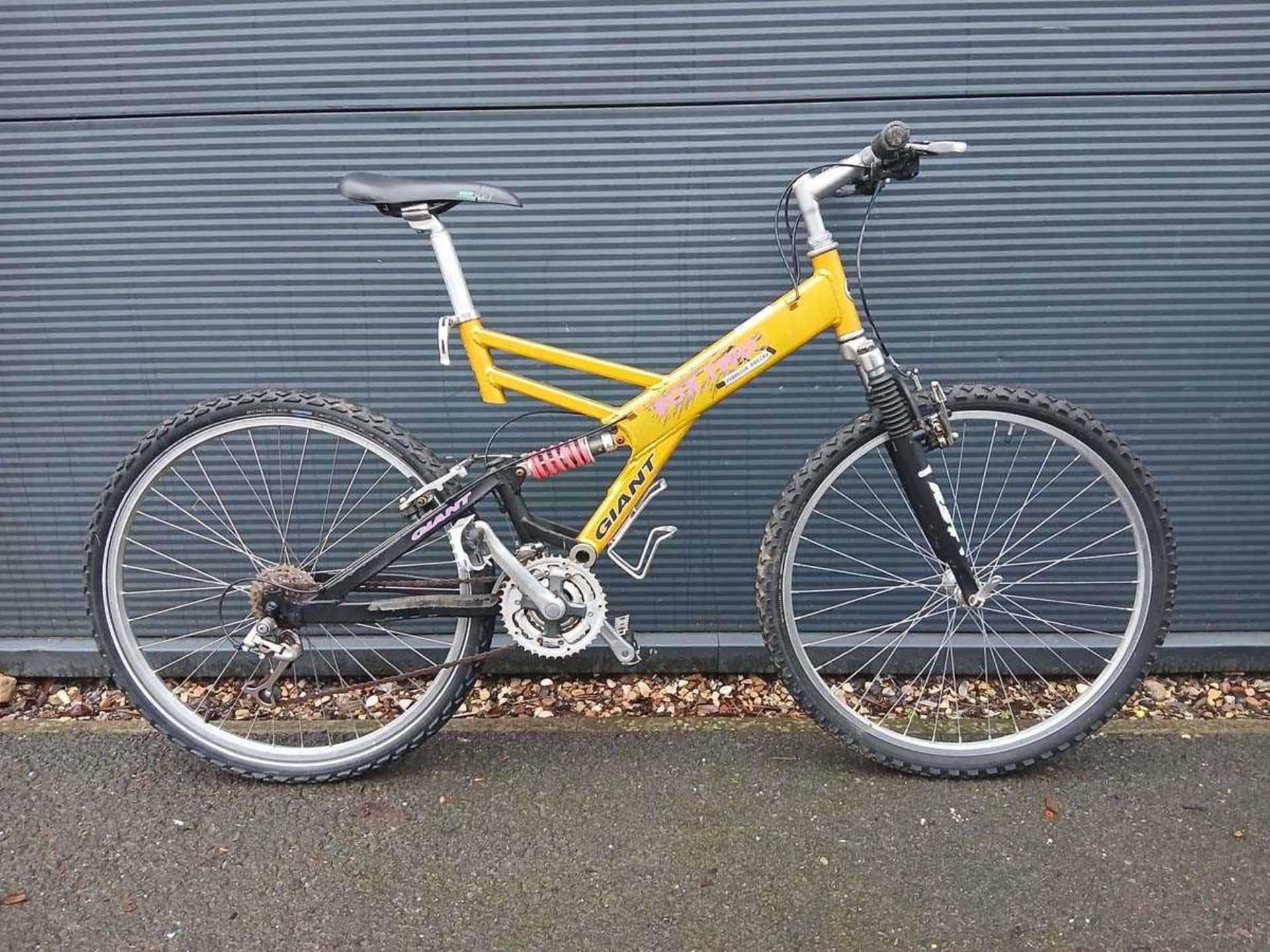 Giant orange dual-suspension bike