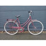 Raleigh red ladies town bike