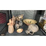 Cage containing pottery ornaments and dishes