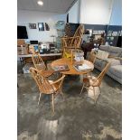 Ercol 384 ash and elm dining suite comprising oval drop side dining table, 2 stick back carver