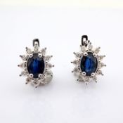 18K white gold cluster earrings detailed with sapphire and brilliant