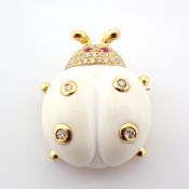 An exquisite agate ladybird pendant or brooch detailed with brilliant diamonds and