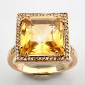 18K Rose gold ring , detailed with 5.20ct citrine and brilliant
