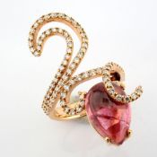 An exquisite 18k ring detailed with 8ct 'cab'tourmaline and 1.23 ct