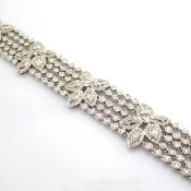 An exquisite 18K white gold bracelet detailed with different cut