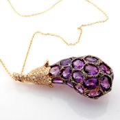 An exquisite aubergine necklace detailed with amethyst and brilliant