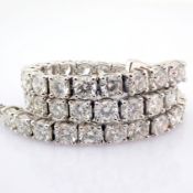 14K white gold tennis bracelet detailed with brilliant