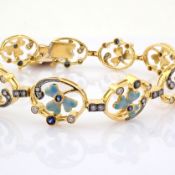 18K yellow gold bracelet detailed with emerald, sapphire and brilliant