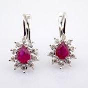 18K white gold cluster earrings, detailed with ruby and brilliant