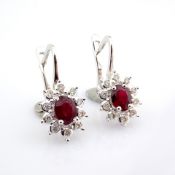 An exquisite cluster earrings made of ruby, brilliant diamonds and