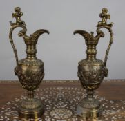 Pair of 19th Century French Gilt Bronze Bacchanalian Ewers with Cherubs