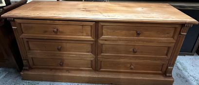 A large pine chest of drawers consisting of six drawers with fluted columns to side (H85cm W180cm