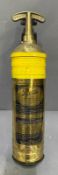 A vintage Pyrene wall hanging fire extinguisher.