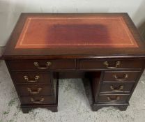 A mahogany ladies' writing desk with red leather top and brass handles (H70cm W90cm D50cm)