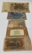 A small selection of antique banks notes various denominations and conditions.