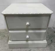A white painted two drawer bedside table (H52cm W51cm D45cm)