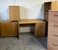 A complete study suite comprising of a desk, two cupboards, bookcase and a four drawer filing