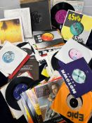 A collection of 45 records by various artists