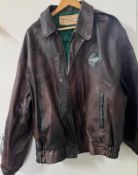 A Morgan leather flying jacket by The Cockpit Clothing Co, Southampton with a brass official plate