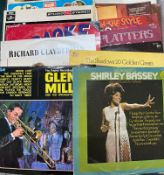 A selection of vinyl records, including Shirley Bassey