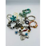 A selection of costume jewellery including some silver items, various styles and finishes.