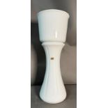 A white Bay Keramik ceramic floor vase and planter