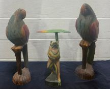 Two wooden parrots and a wooden frog AF