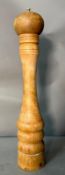A over sized pine pepper mill.Height approximately 51cm.