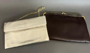 Two vintage clutch purses in gold and brown