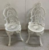 Two white painted cast-iron garden chairs