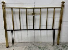 A Victorian-style brass bedhead with ball finials and a central decorative Starburst by Wallback Fox