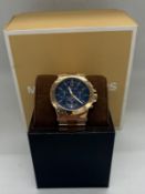 A Michael Kors, rose gold Gents watch in original box