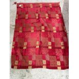 A Laura Ashley red and gold throw (200cm x 140cm)