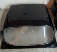 A black fibreglass classic car roof, possibly from an MG Midgett 126cm x 126cm