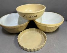 A selection of mixing bowls and pie dish
