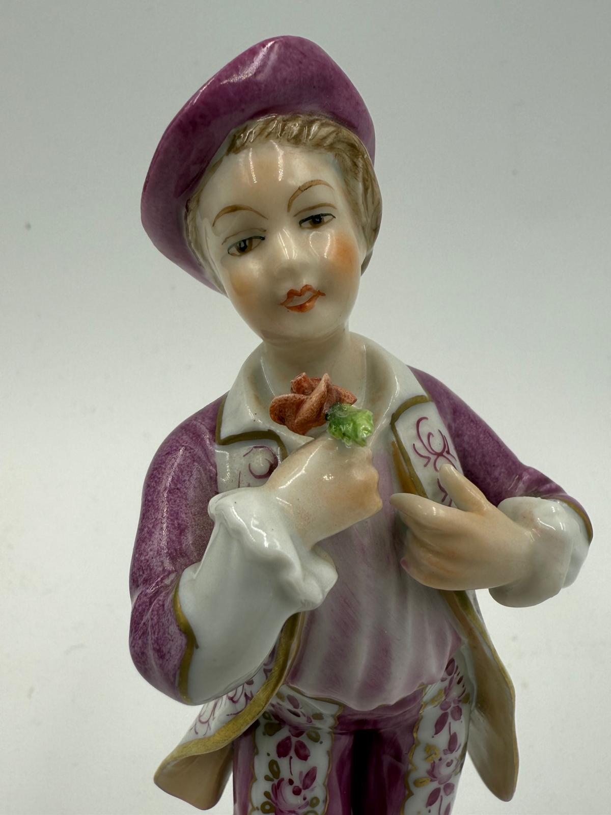 An Unterweissbach porcelain figure of a young man. Height approximately 14cm. - Image 2 of 4