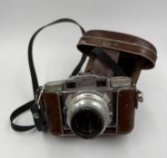Super Paxette camera and leather case