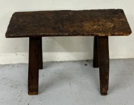18th Century oak stool on four splayed legs. H 52cm x D23cm x W65cm