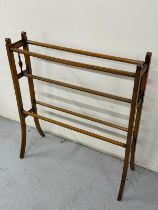 An Edwardian beech towel rail H 86cm x D 16cm x W 76cm