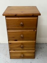 A pine four drawer bedside table H 76cm x W 44cm x D 36cm