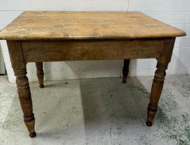A pine kitchen table on turned legs with drawer to end - 75cm x 115cm x 79cm