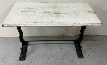 A repurposed console table with cast iron legs. H 71cm x D 56cm x W 106cm