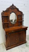 A mahogany chiffonier comprising of a single long drawer over two door cupboard, a mirrored
