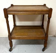 Oak two tier tea trolley on wheeled turned castors (64cm x 44cm x H75cm)
