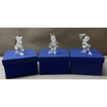Three Swarovski crystal Disney showcase figures to include Pluto and Donald Duck. Boxed