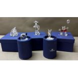 Five boxed Swarovski crystal figures to include Pooh Bear, Piglet and Eyore