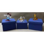 Three Swarovski crystal Disney showcase characters, Minnie Mouse, Dumbo and Pluto