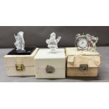 Three boxed Swarovski crystal figures Father Christmas, Teddy Bear clock and a squirrel on signed