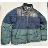 A used Burberry Tritone puffer jacket, XL.